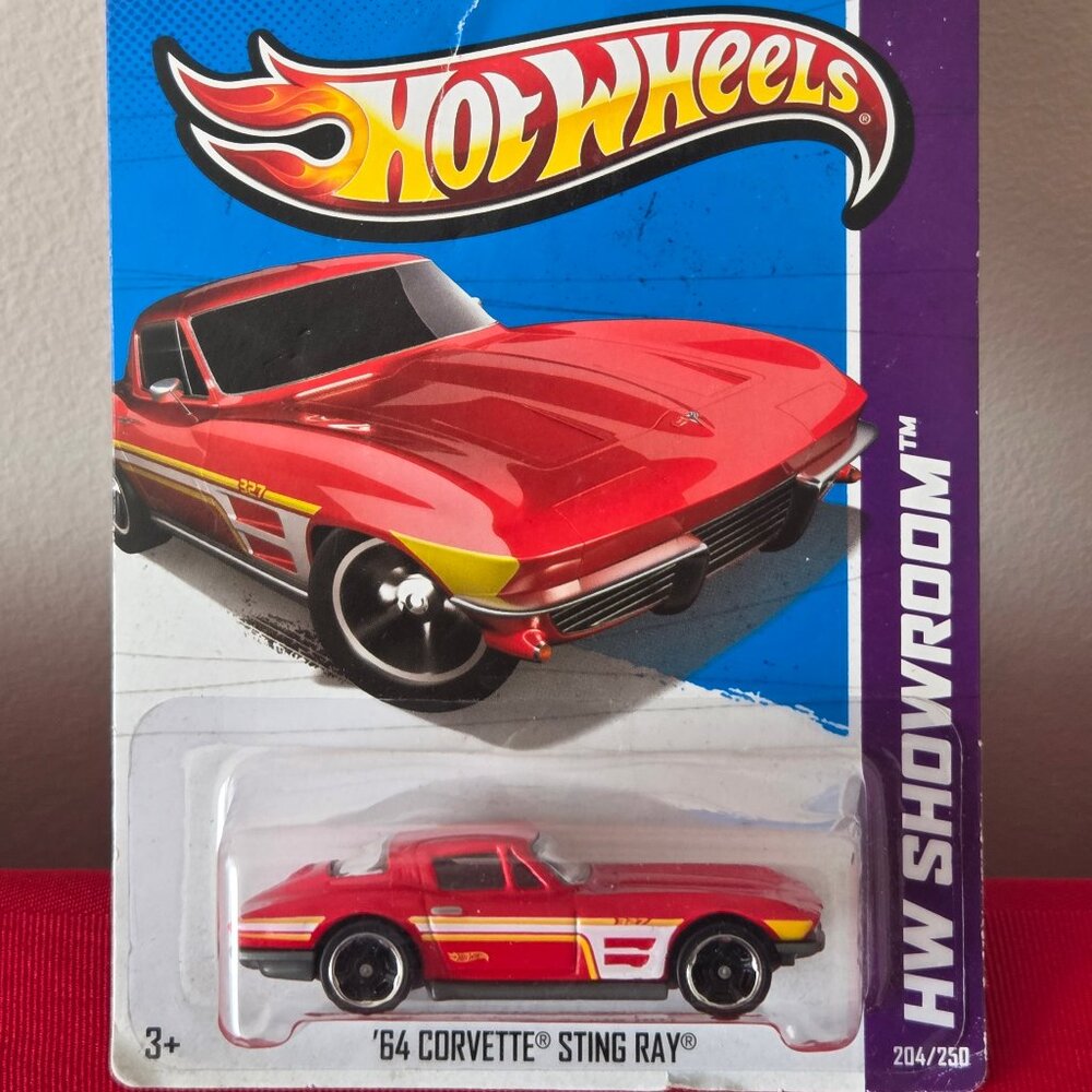 2012 HOT WHEELS, '64 CORVETTE STING RAY, MINT IN THE PACKAGE!!!